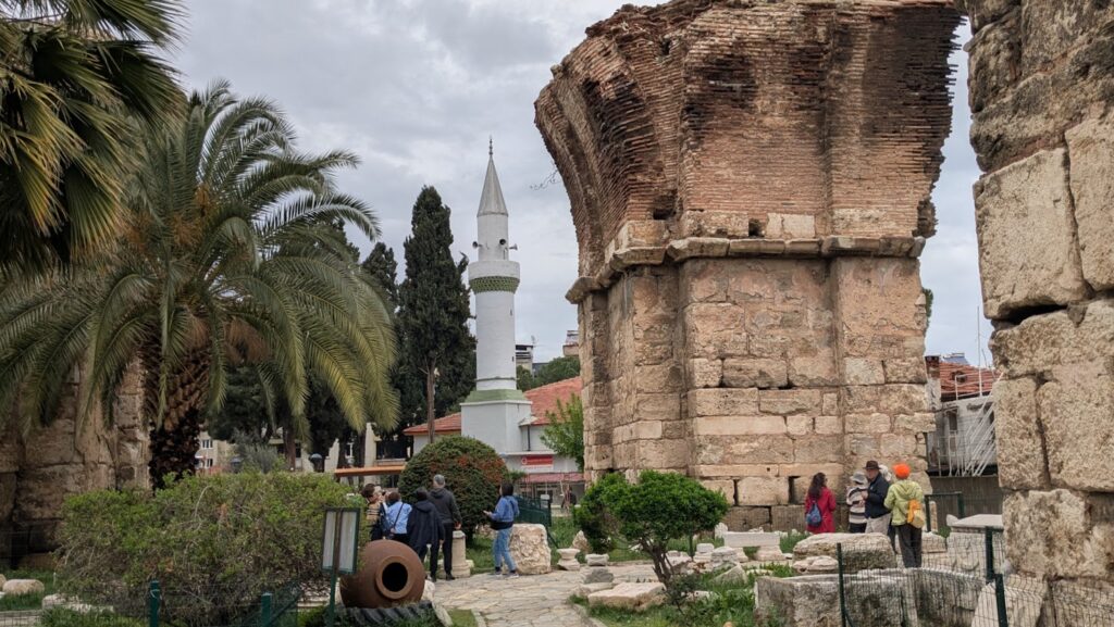 Church of St. John in Alaşehir, Philadelphia in Biblical times, with a minaret behind.